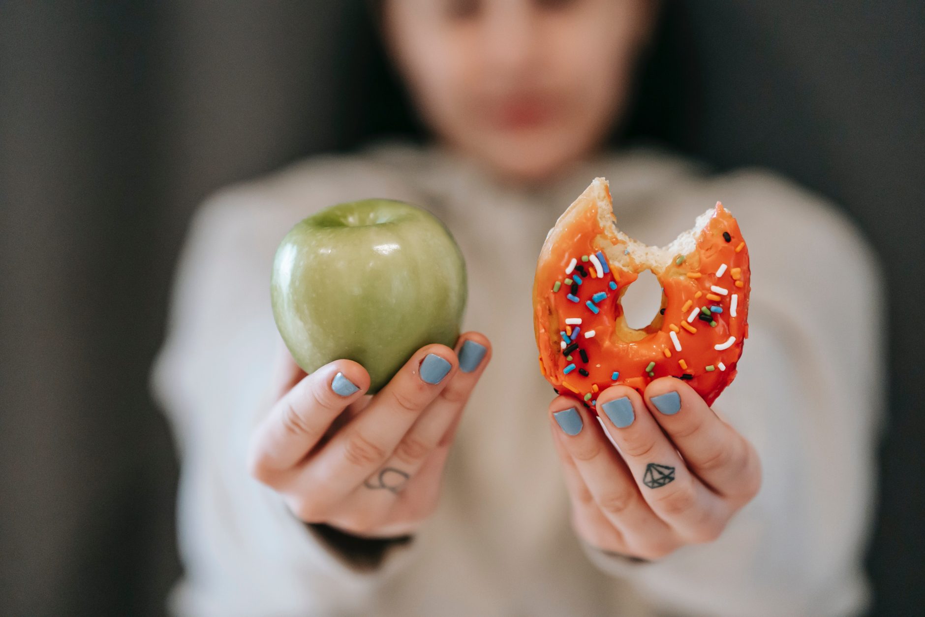 Choice between green apple or donut