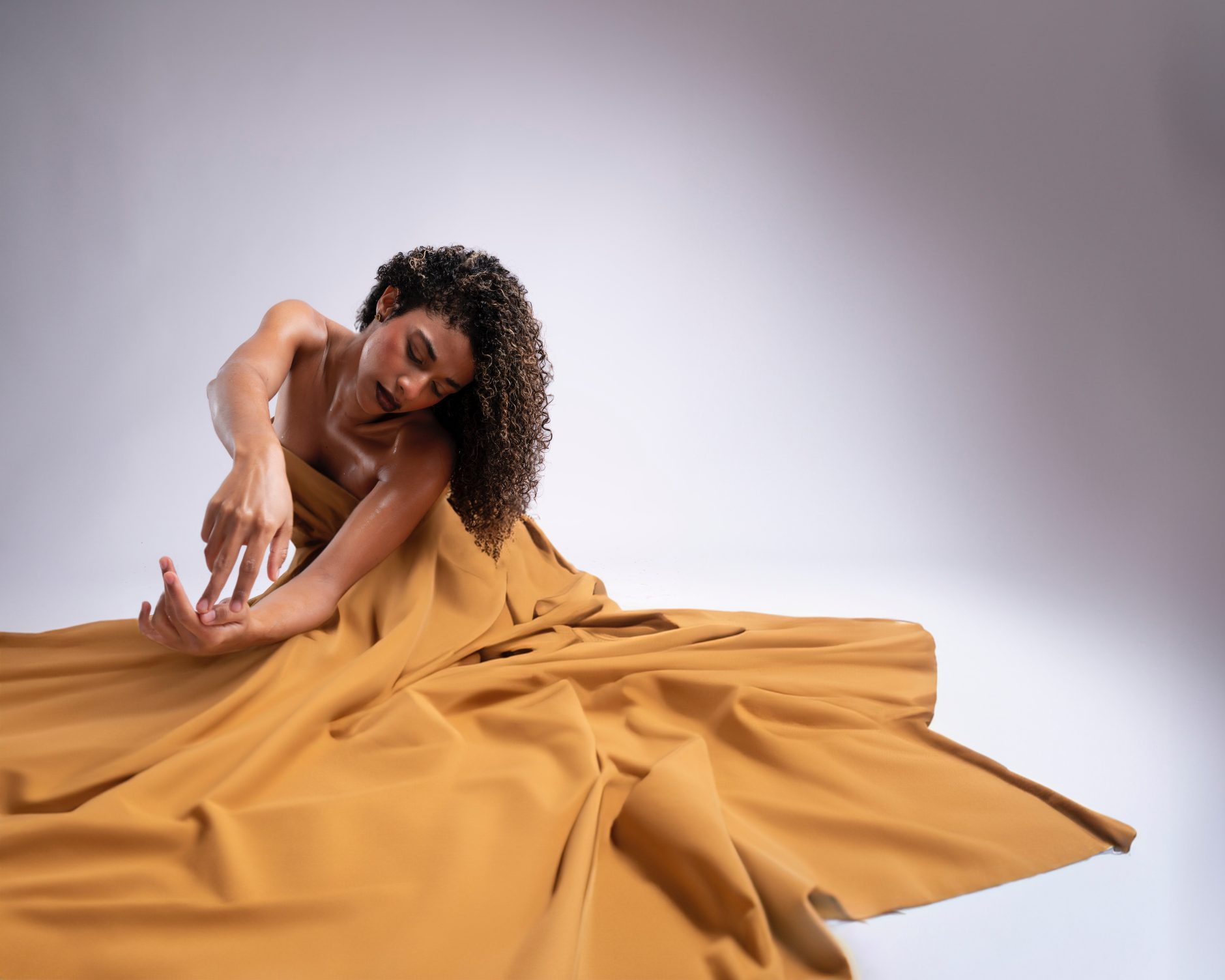 Woman in fashion posing in yellow bamboo fabric